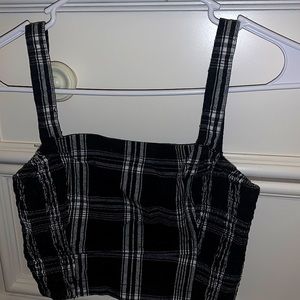 white and black tank (tight on sides)